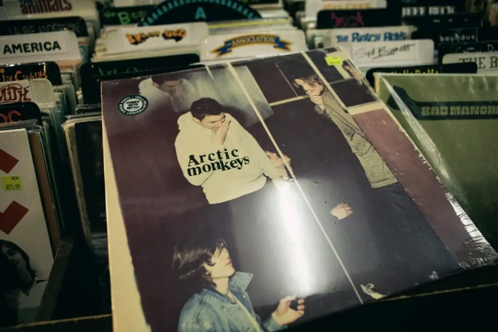 A record store selection that has Humbug by The Arctic Monkeys pulled out.