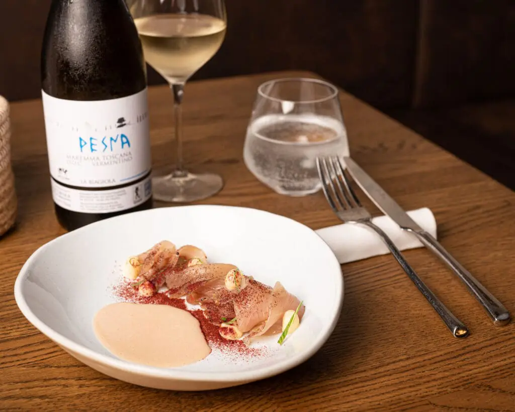 Fresh catch sashimi in ceviche with Tiger's milk, corn and red spice mix from 53 Untitled.