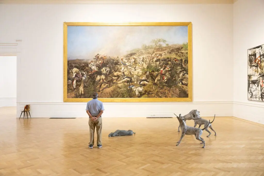 A person admiring art in the National Gallery of Modern Art in Rome, Italy