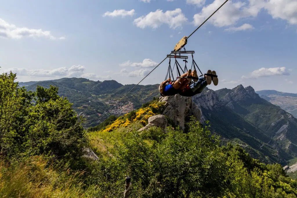 A person ziplining along Rocca Massima, just outside of Rome in Italy
