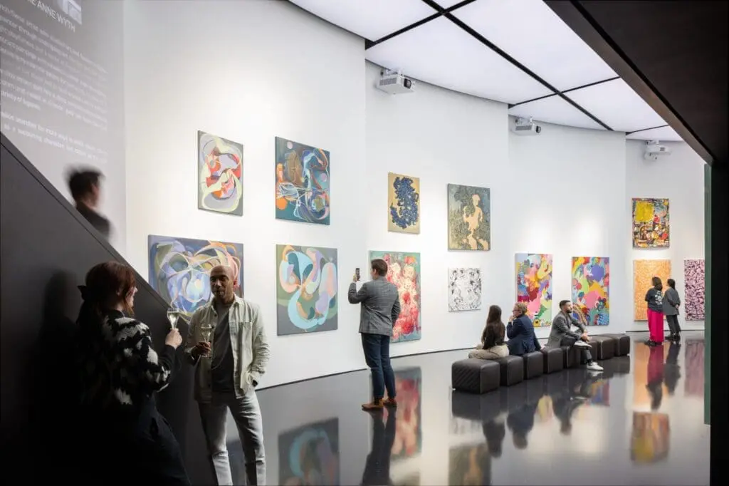 Art lovers enjoying gallery at art'otel London Hoxton Shoreditch hotel with pool