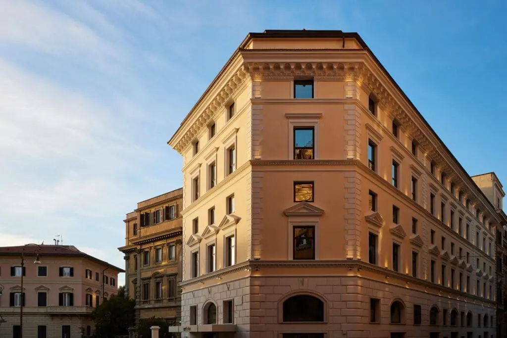 Exterior view of art’otel Luxury art hotel Rome featuring historic architecture, elegant facade, and city street.