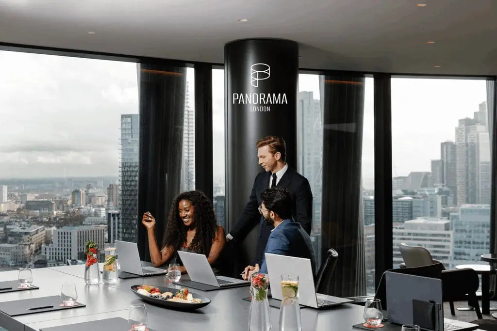 Modern meeting room at art'otel London Hoxton Shoreditch hotel with spa, featuring panoramic city views and elegant design.