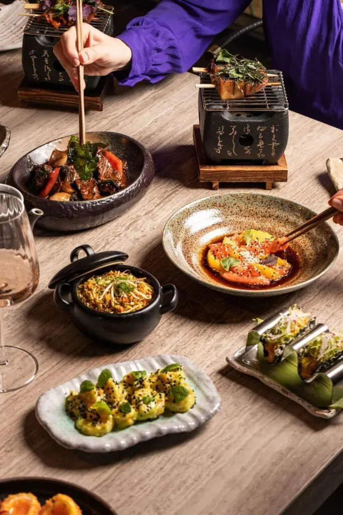 Delicious Asian-inspired dishes served at art gallery art'otel hotel Rome, featuring vibrant flavors, elegant plating, and modern presentation.