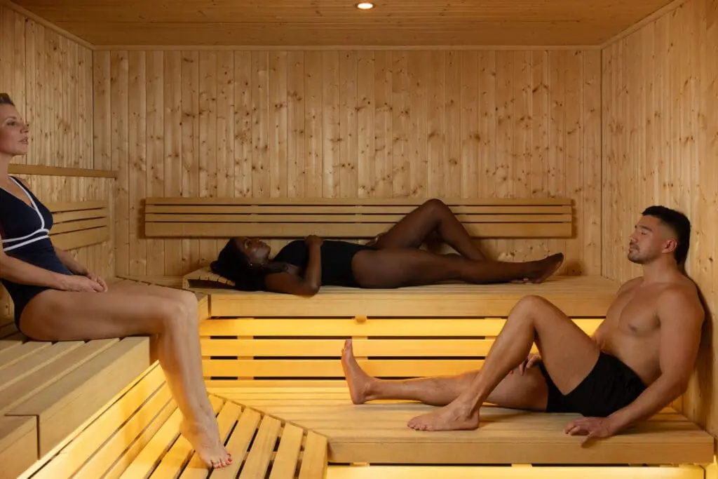 Three people relaxing in spa at art'otel London Hoxton Old Street hotel with spa